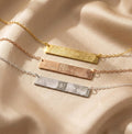 3 engraved fingerprint necklaces against a white background. Personalized minimalist bar necklace Custom engraved bar pendant Minimalist nameplate necklace Custom name bar necklace Engraved horizontal bar necklace Personalized name bar pendant Minimalist engraved necklace Customizable bar pendant jewelry Engraved bar necklace for women Custom coordinates bar necklace Minimalist bar pendant with engraving Personalized message bar necklace