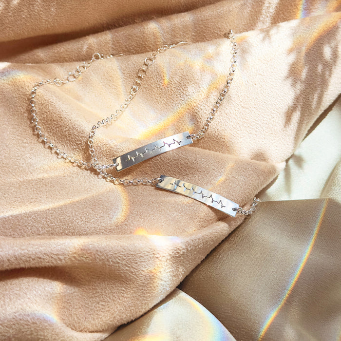 Minimalist heartbeat engraved bracelet gold and silver comparison