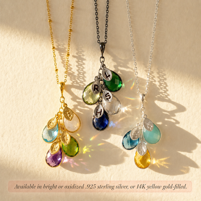 Personalized family birthstone necklace available in sterling silver, 14K gold filled, and rose gold filled with cascading teardrop gemstone charms.