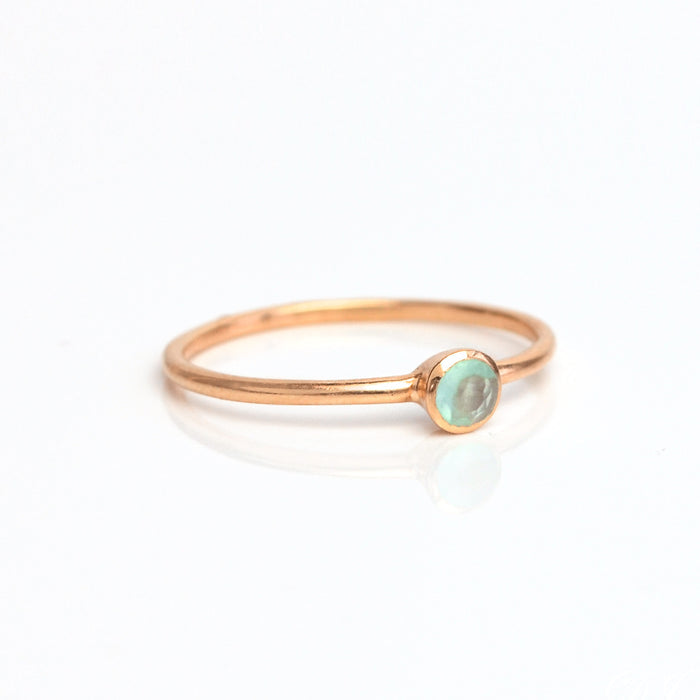 Single rose gold plated dainty 3mm aqua chalcedony gemstone ring. march  birthstone. On white background. 925 sterling silver, birthstone ring, stacking ring, stackable, birthstone jewelry, facet gemstone