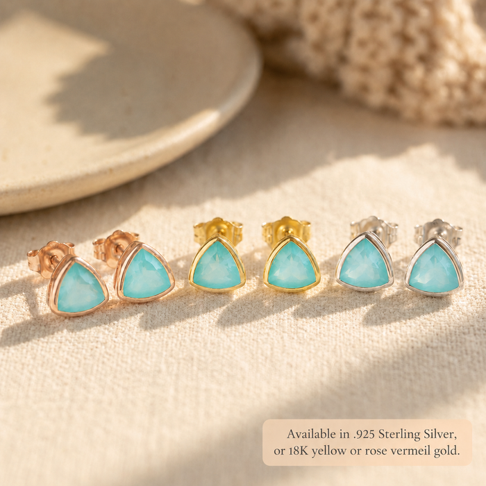 Aqua chalcedony triangle stud earrings shown in sterling silver, yellow vermeil, and rose vermeil finishes.