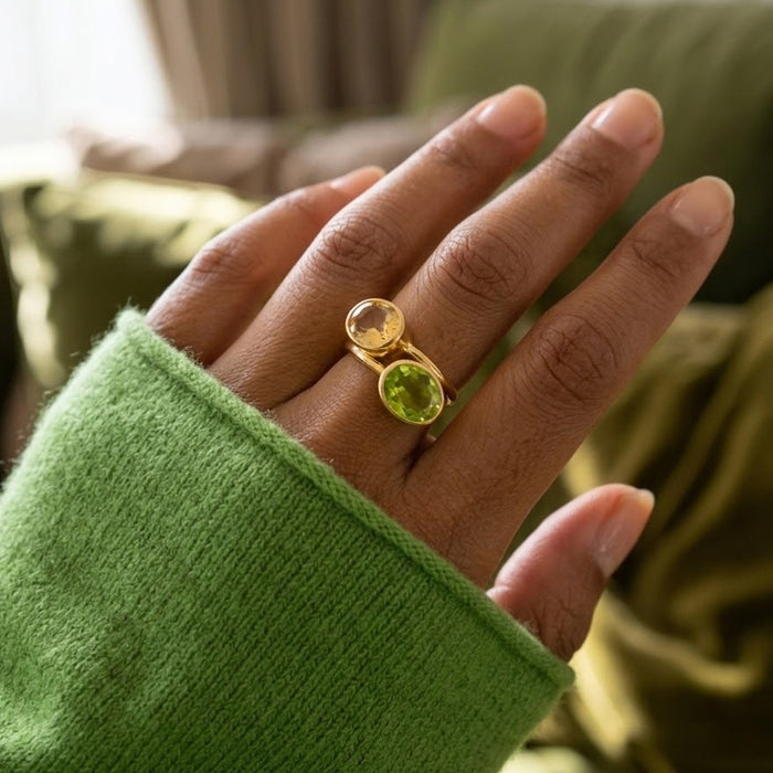 Model wearing citrine and peridot birthstone ring as a dainty August and November gemstone ring