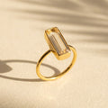 Clear quartz bar ring in gold vermeil, faceted rectangle April birthstone stacking ring