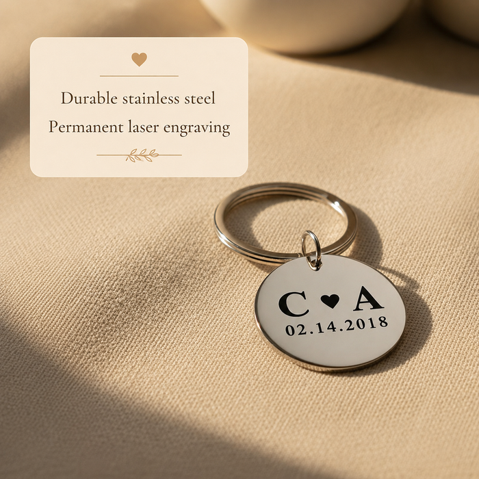 Durable stainless steel round keychain with permanent laser engraving and initials with date.