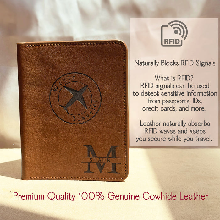 Personalized leather passport holder engraved with a monogram and “World Traveler” airplane design, made from premium 100% genuine cowhide leather. The product is shown in a warm natural light setting with text explaining RFID-blocking benefits. Ideal for travelers, this custom passport cover naturally absorbs RFID signals to protect sensitive data from passports, IDs, and credit cards. A perfect gift for men, groomsmen, or frequent flyers, combining style, security, and customization.