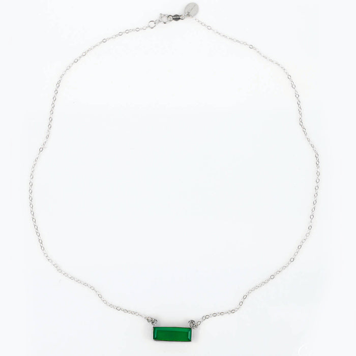 Single sterling silver chain with green tourmaline horizontal bar adira necklace on white background