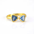 A gold kyanite ring. Kyanite Quartz triangle ring, adjustable Kyanite Quartz ring, double triangle Kyanite, personalized Kyanite jewelry, sterling silver Kyanite ring, gold Kyanite Quartz ring, rose gold Kyanite ring, unique Kyanite gemstone, September birthstone ring, custom triangle-cut Kyanite, bespoke Kyanite Quartz jewelry, chic Kyanite accessory, elegant blue gemstone ring, Kyanite stacking ring, custom gemstone jewelry, trendy triangle ring, adjustable Kyanite band, unique birthstone jewelry