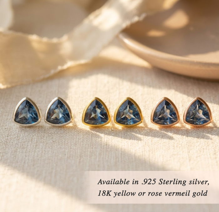 Minimalist gold stud earrings with faceted blue kyanite gemstone