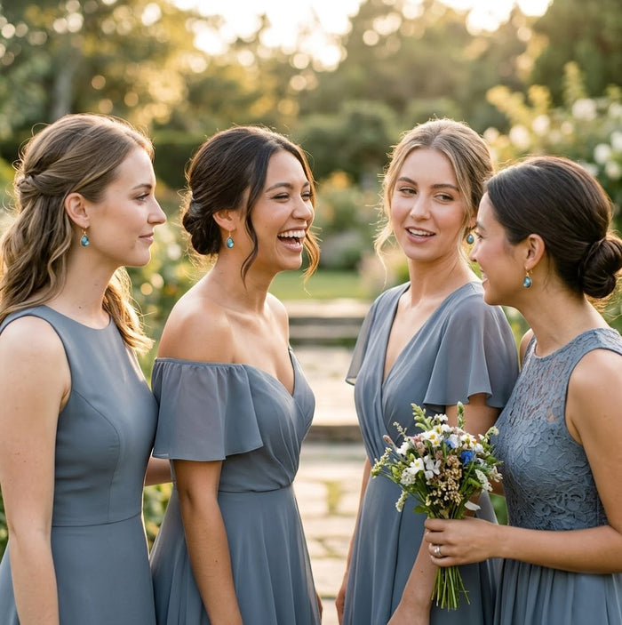 Bridesmaids wearing gray dresses with labradorite gemstone earrings, styled as elegant wedding jewelry or bridesmaid gifts with soft blue-green stone accents.