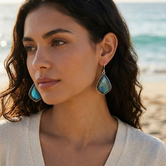 Blue flash labradorite earrings dangle drop gemstone jewelry on a model