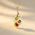 Personalized necklace for mom or grandma featuring three engraved name discs with birthstone charms in 18K gold vermeil, perfect for new moms, mothers-in-law, or grandmothers showcasing kids’ or grandkids’ names in a meaningful keepsake jewelry gift.