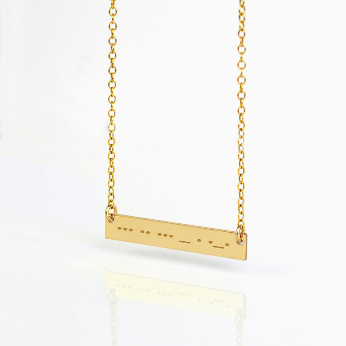 Dainty gold Morse code bar necklace with dots and dashes engraved across a skinny horizontal plate on a delicate chain, minimalist 14K gold filled personalized jewelry, custom secret message necklace for her, meaningful gift for best friend, sister or girlfriend.