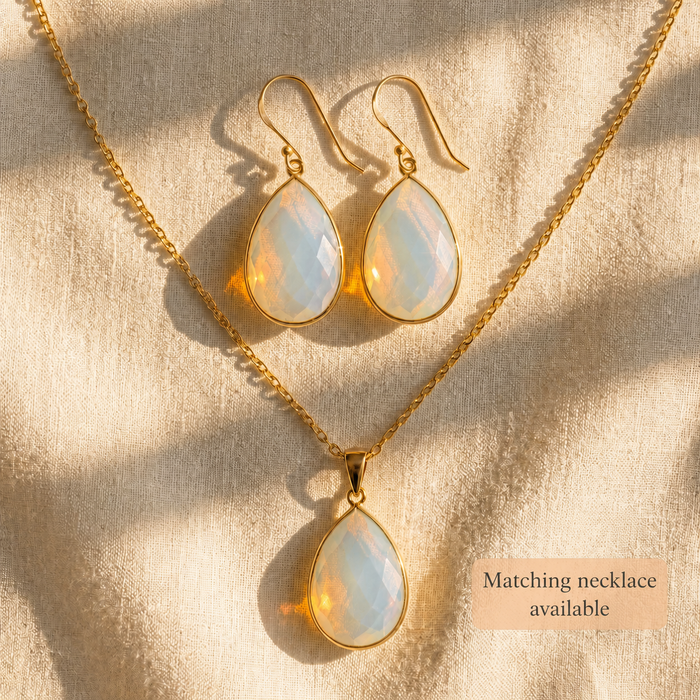 Opalite earring and matching necklace set shown on cream fabric with a gift-ready jewelry styling.
