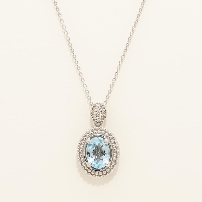 Oval Blue Topaz Necklace in Sterling Silver with Diamonds (1/20ct tw)