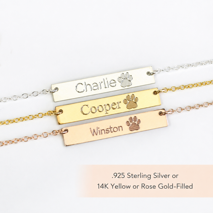 Paw print engraving template showing detailed etching style for custom paw print necklaces. Upload your pet’s paw print photo for a precise, lifelike engraving on sterling silver, gold filled, or rose gold filled bar pendant. Perfect for pet memorial gifts and personalized jewelry for animal lovers.