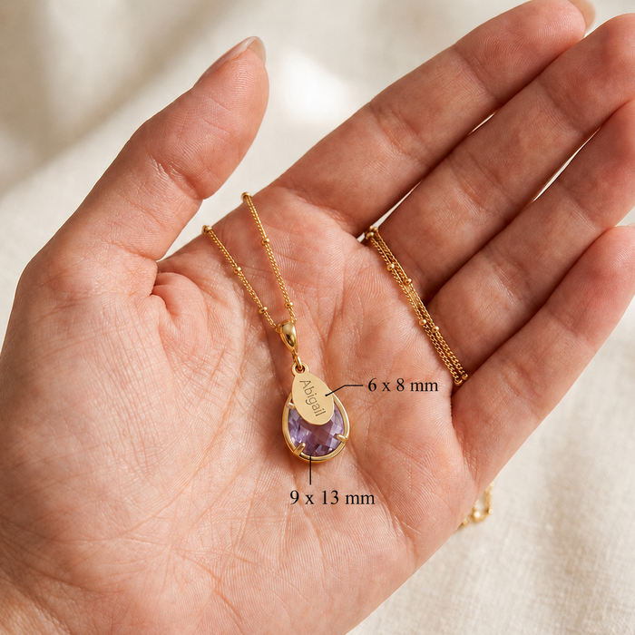 Close up of alexandrite quartz necklace showing 9 x 13 mm stone and 6 x 8 mm engraved oval name tag