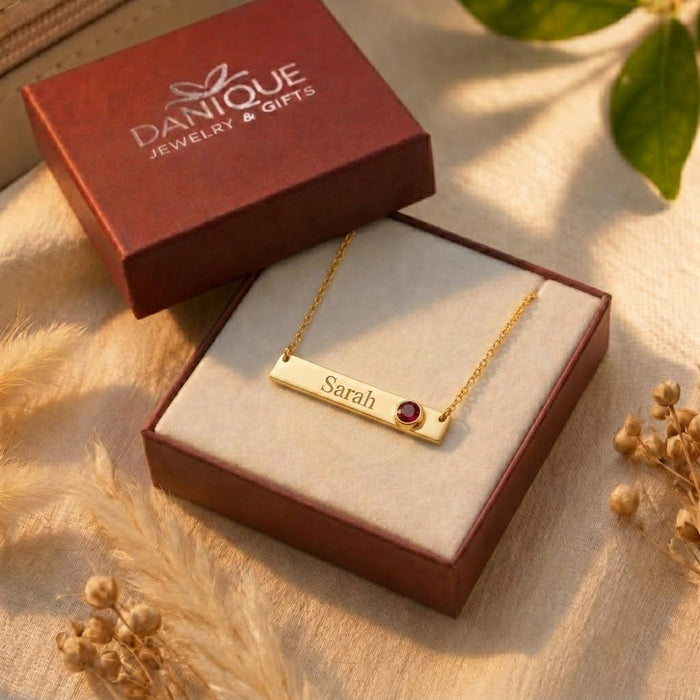 Personalized birthstone bar necklace in a Danique Jewelry gift box, ready for gifting.
