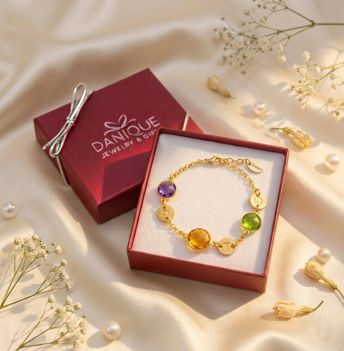 Custom birthstone bracelet for mom with engraved initial charms displayed in luxury gift box, personalized family jewelry gift for Mother’s Day or birthday