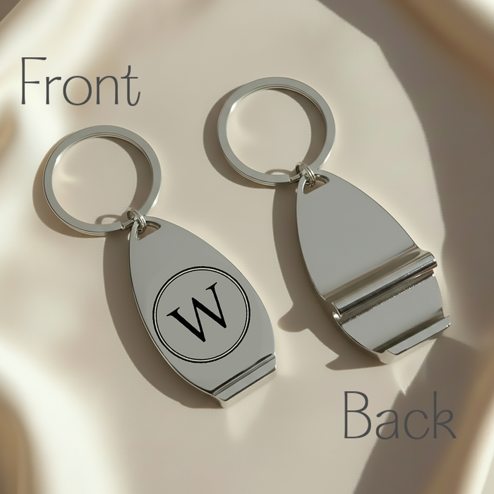 Front and back view of personalized bottle opener keychain showing engraved initials. Custom stainless steel keychain with monogram engraving.
