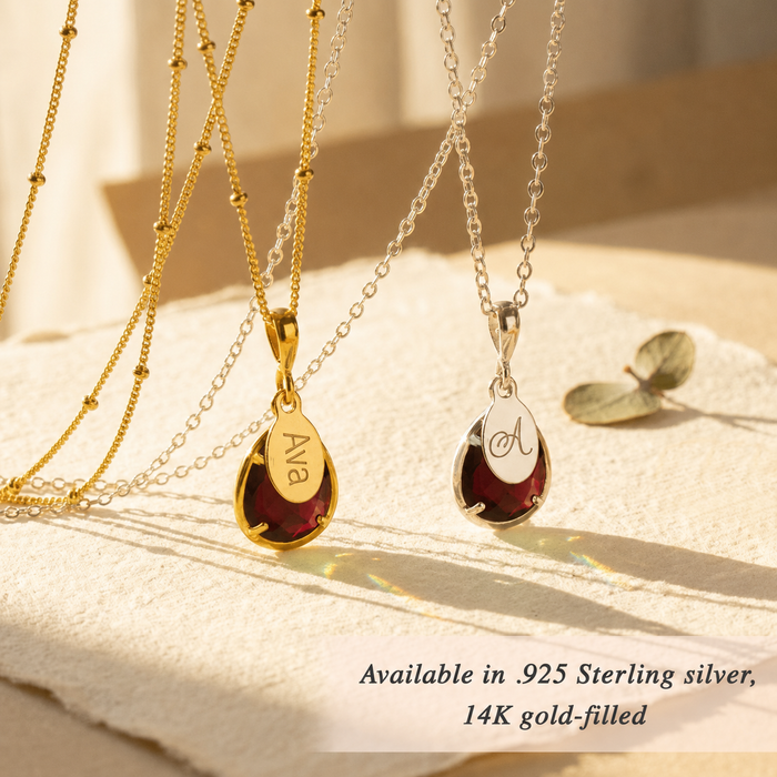 Gold and silver garnet necklaces showing .925 sterling silver and 14K gold-filled options.