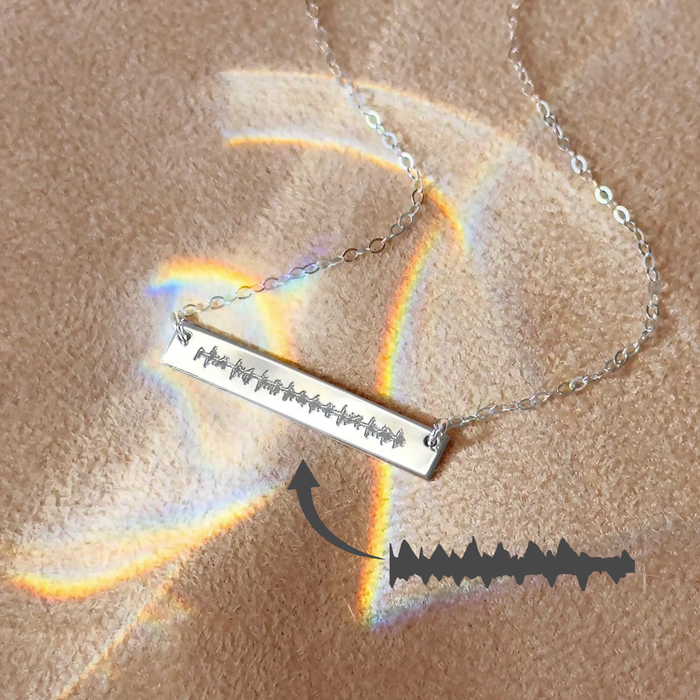 Elegant personalized heartbeat necklace engraved from an actual baby’s heartbeat, handmade in sterling silver or gold, a sentimental pregnancy, new mom, or memorial gift, perfect as a keepsake of love and motherhood, customized jewelry by Danique Jewelry.