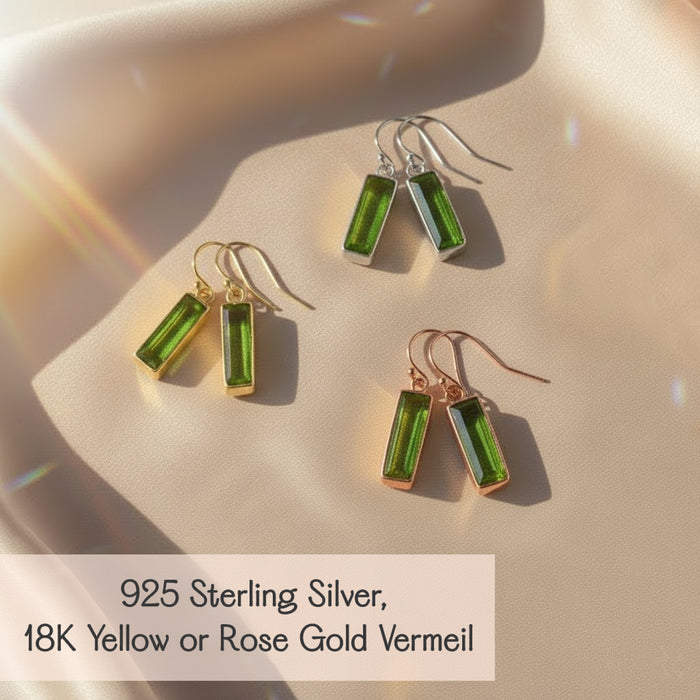 Peridot baguette earrings shown in sterling silver, yellow gold and rose gold