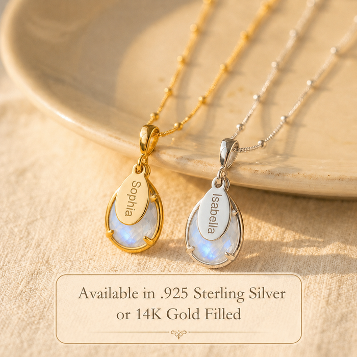 Rainbow moonstone name necklace shown in sterling silver and 14K gold filled with personalized oval name tags.