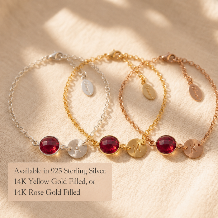 Ruby initial bracelets in sterling silver, yellow gold, and rose gold finishes