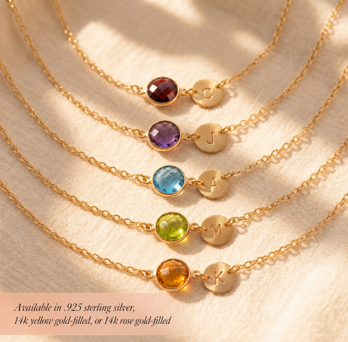 Personalized birthstone bracelets with colorful gemstones and round initial charms
