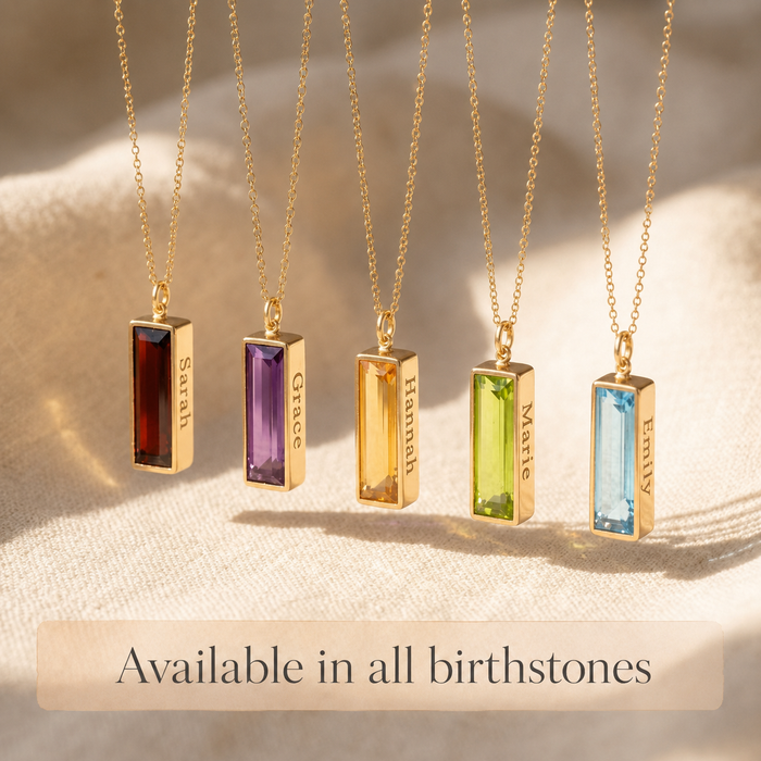 Gemstone bar necklaces shown in a colorful birthstone collection: January Garnet, February Amethsyt, Novemberr Citrine, August Peridot, December Blue Topaz.