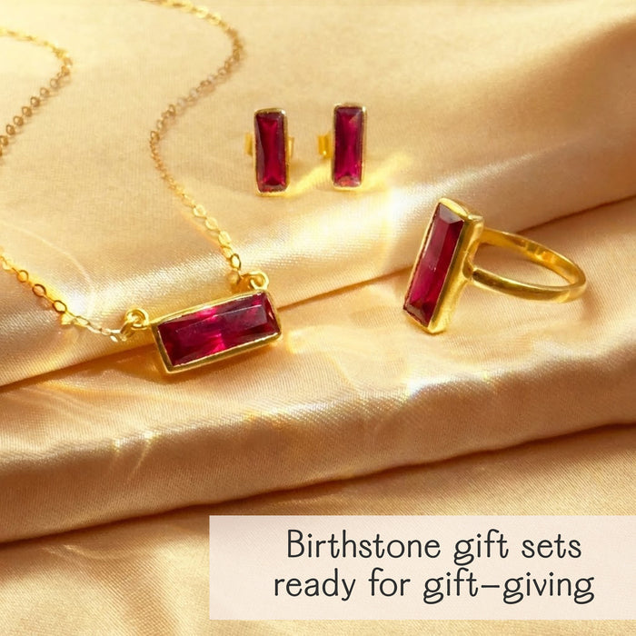 Ruby birthstone gift set with matching bar necklace, earrings, and ring for July birthdays.