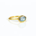 a gold labradorite ring shown on white background. stackable! Stacking rings, bezel set, small oval, tiny oval, dainty oval, birthstone rings, sterling silver stamp, birthstone ring, birthstone jewelry, iridescent gemstone, gray birthstone