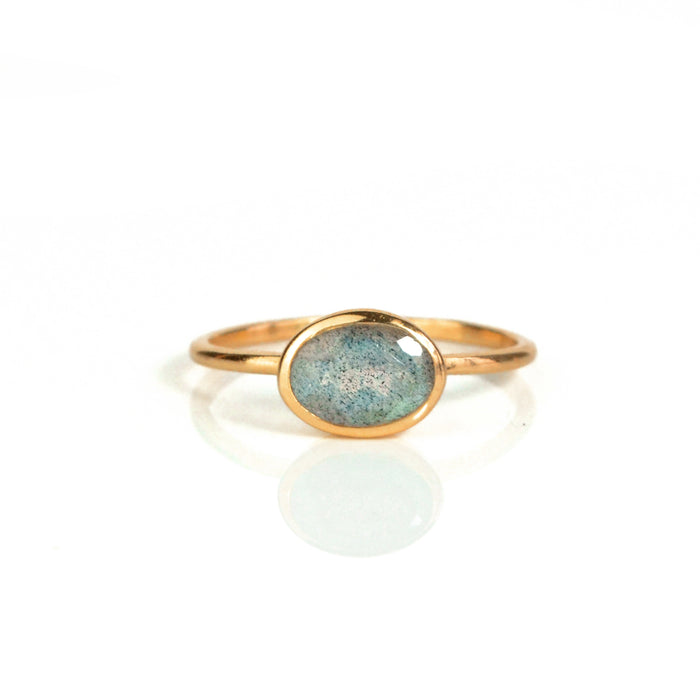 a rose gold labradorite ring shown on white background. stackable! Stacking rings, bezel set, small oval, tiny oval, dainty oval, birthstone rings, sterling silver stamp, birthstone ring, birthstone jewelry, iridescent gemstone, gray birthstone