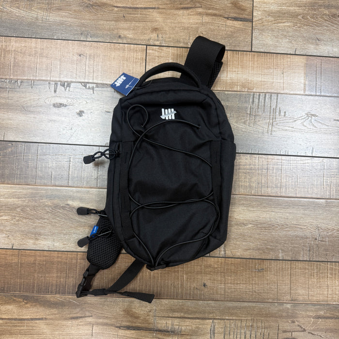 UNDEFEATED MINI CROSSBODY BAG