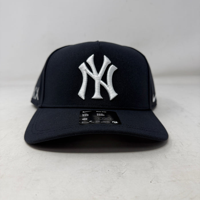 Yankees Nike x KAWS Navy Dri-FIT Structured A-Frame Adjustable Hat